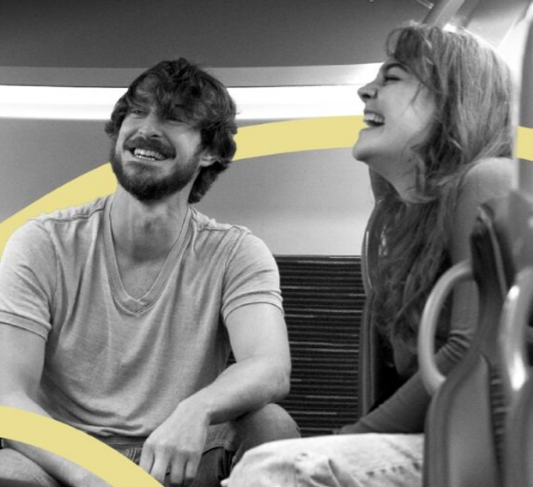 friends laughing on the bus