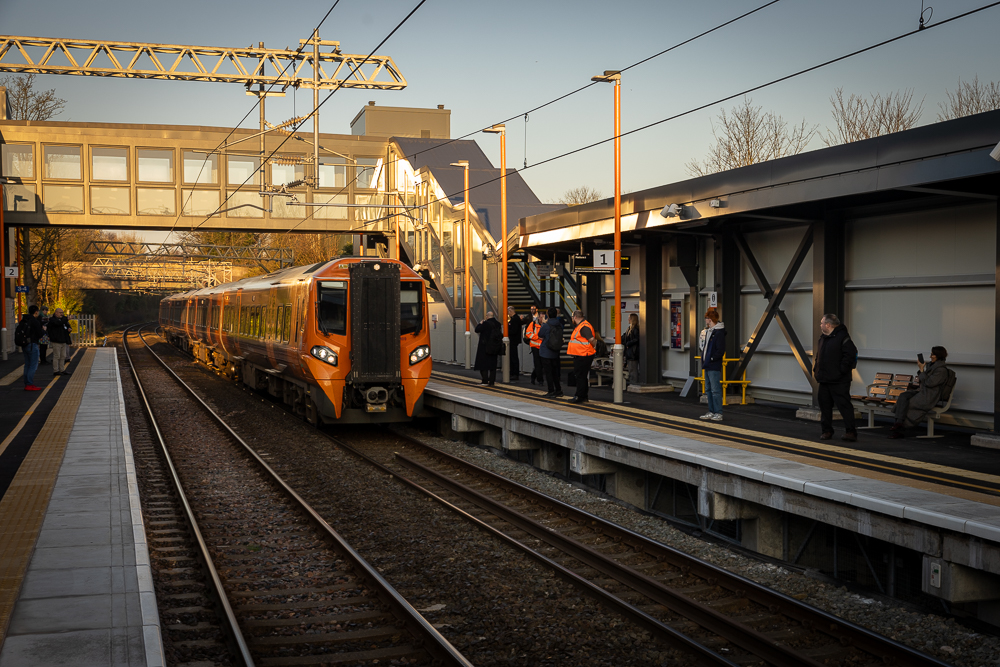 An image of a West Midlands Railway train pulling into the platform at Willenhall railway station.